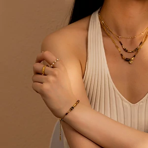 Arany Színű Sárgaréz Karkötő Barna Gyöngy Díszítéssel