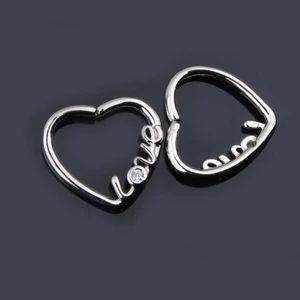 Ezüst Színű 1db-os Szív Alakú Love Feliratos Cirkonia Köves Hamis Piercing Balos