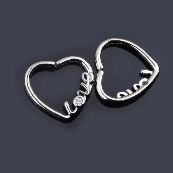 Ezüst Színű 1db-os Szív Alakú Love Feliratos Cirkonia Köves Hamis Piercing Balos